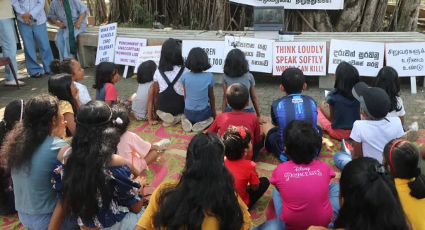 Children holding signs during a child rights awareness event